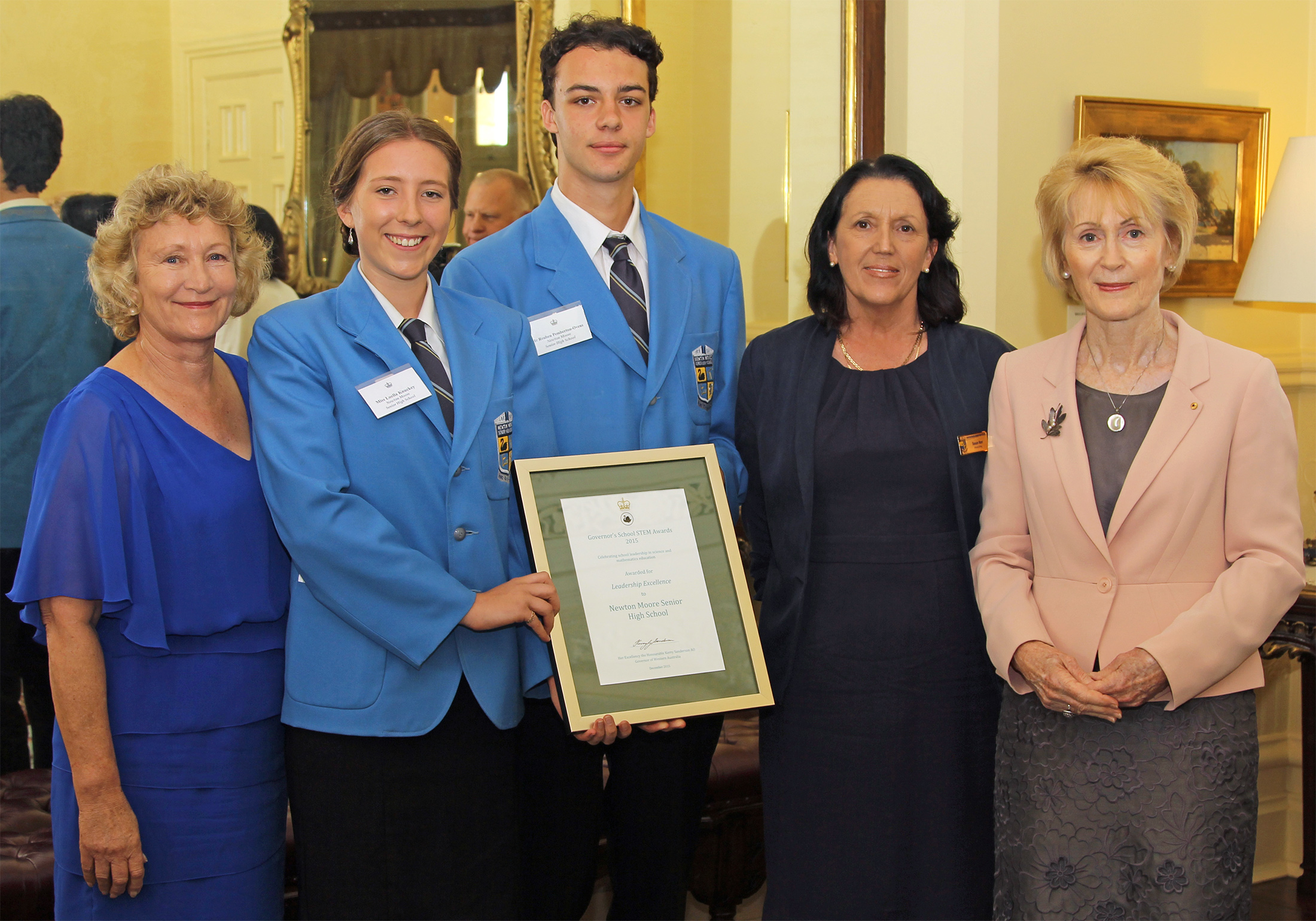 Newton Moore receiving Governor School STEM award