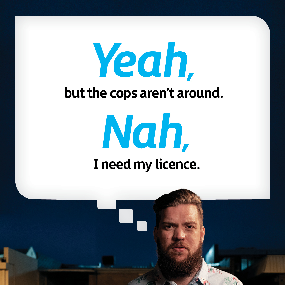 A man looking at the camera, considering whether or not to drink drive