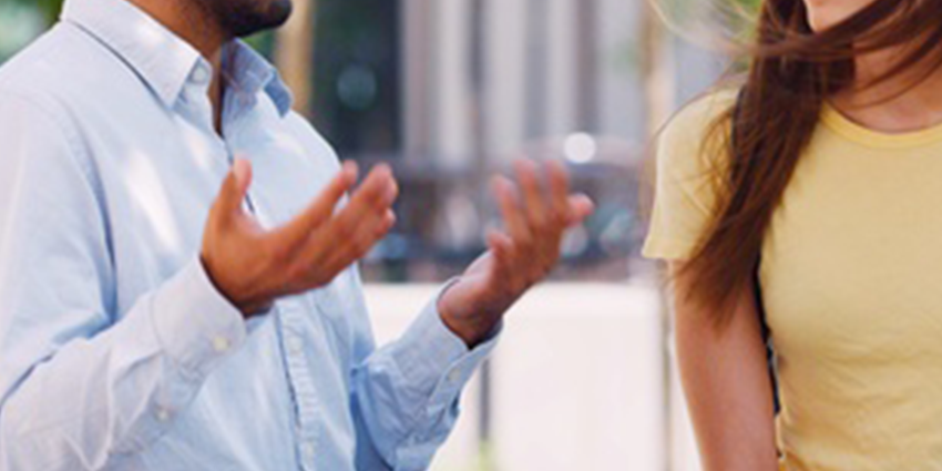 a man talks to a female