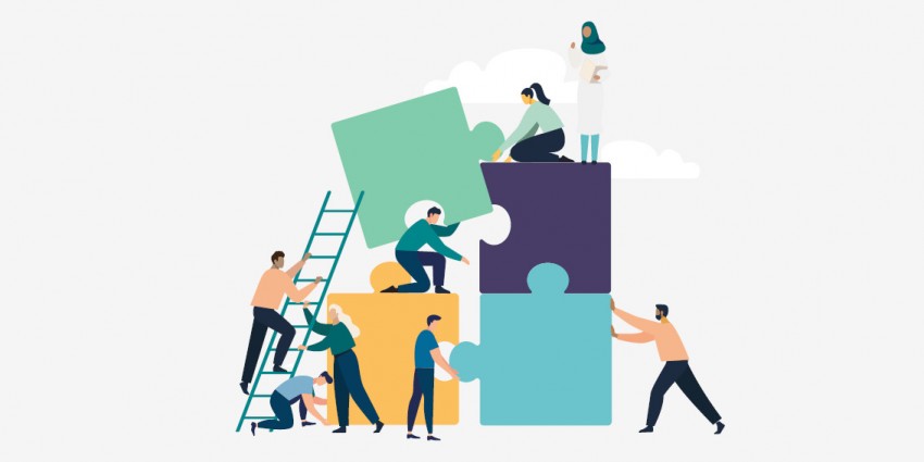 Graphic - people building four puzzles