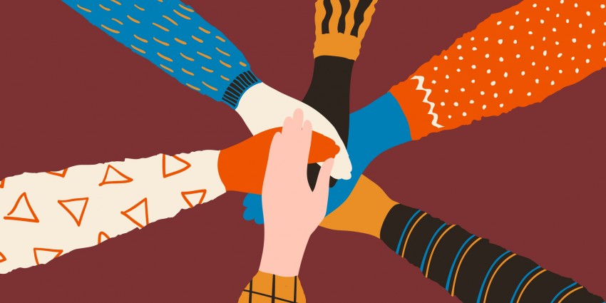 Image of people's hands touching