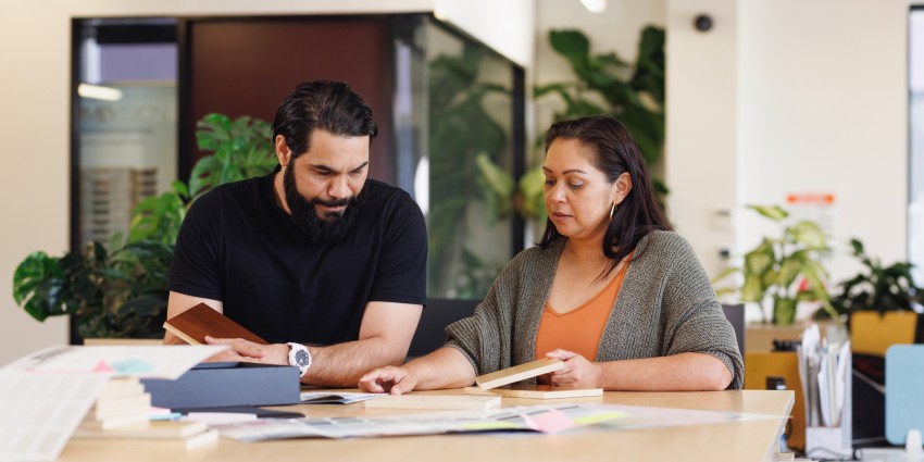 Male And Female Aboriginal Australian Designers Collaborating 