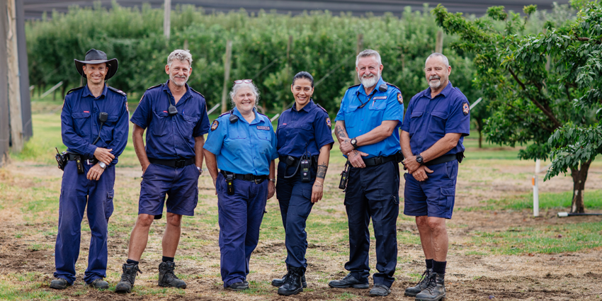 Vocational Support Officer standing at Karnet Prison Farm