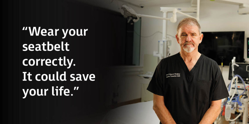 Professor Steve Dunjey State Director of Trauma Royal Perth Hospital standing in a hospital room, advising people to wear their seatbelts correctly