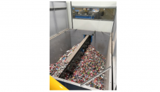 Container Deposit Scheme 10 cent refund banner, cans in crusher